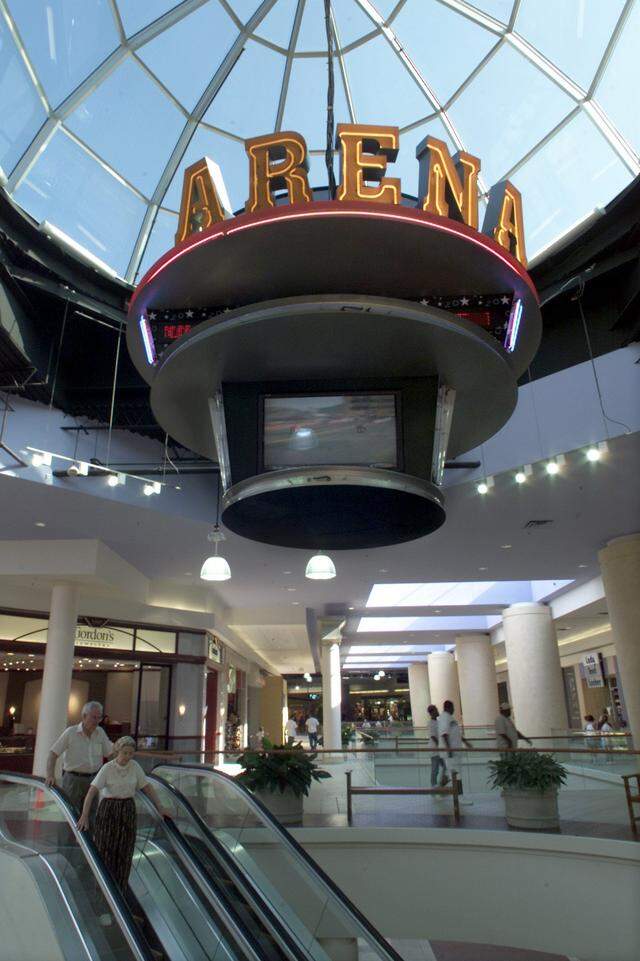 July 18, 2000: Ridgmar is celebrating its re-grand opening after spending $70 million in mall renovations. One added feature are the three TV screens near the middle of the mall which will give sports updates as well as broadcast sporting events.